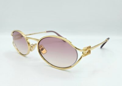 Lunettes de soleil MIU MIU