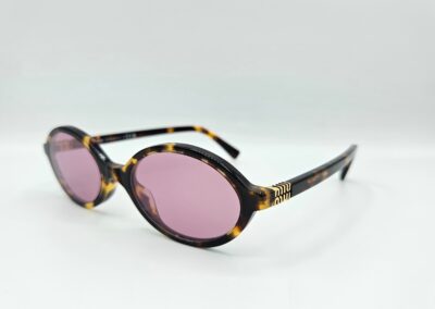 Lunettes de soleil MIU MIU