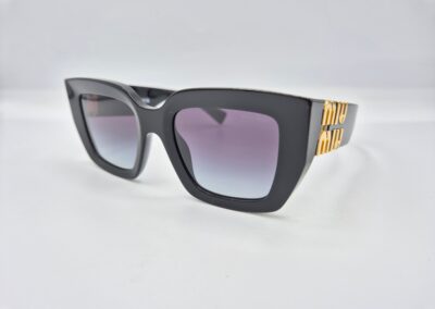Lunettes de soleil MIU MIU