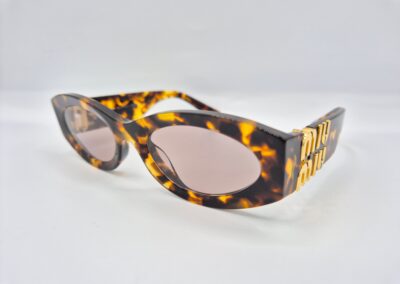 Lunettes de soleil MIU MIU